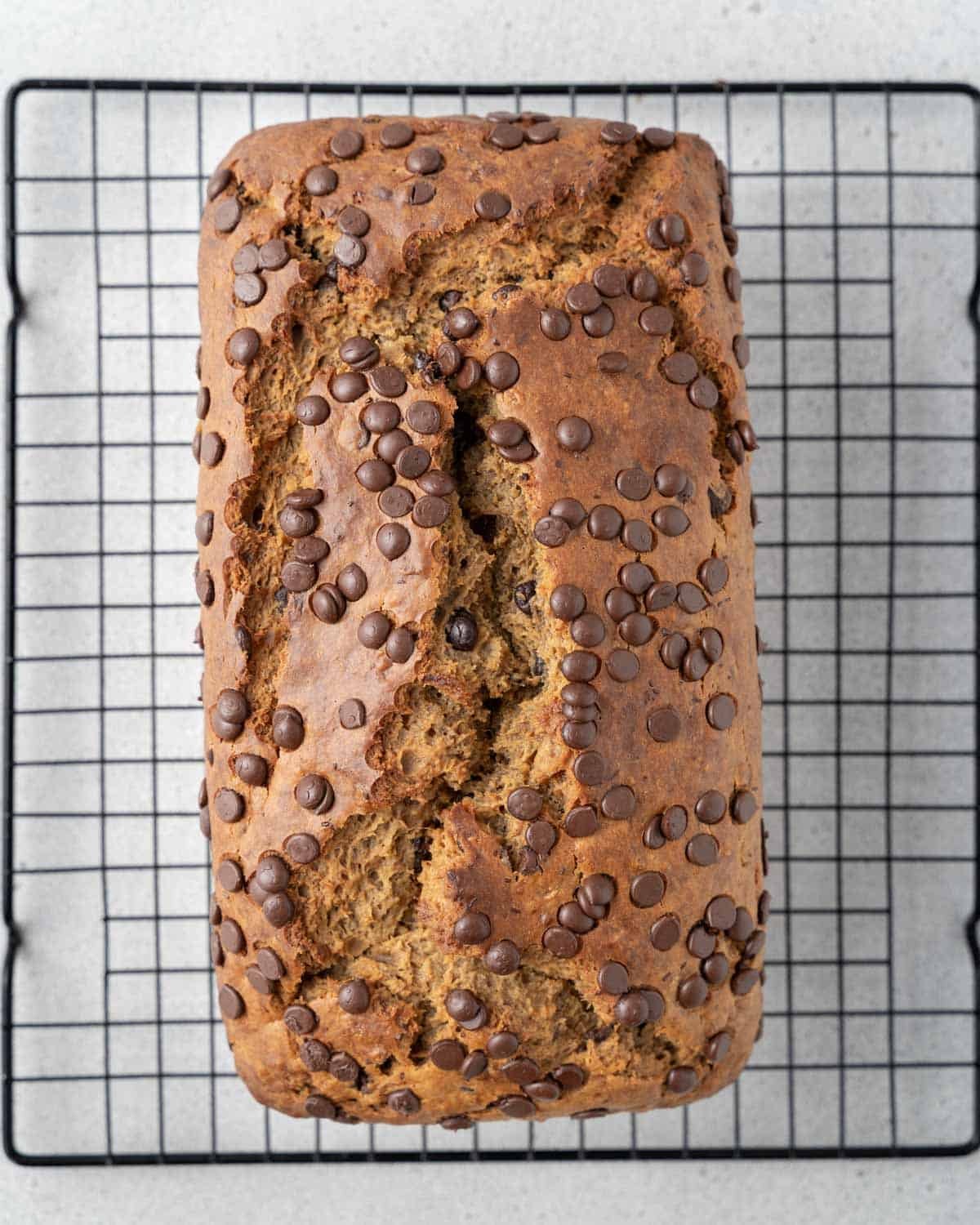 baked banana bread on a cooling rack.