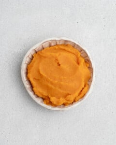 Cooked sweet potato in a bowl.