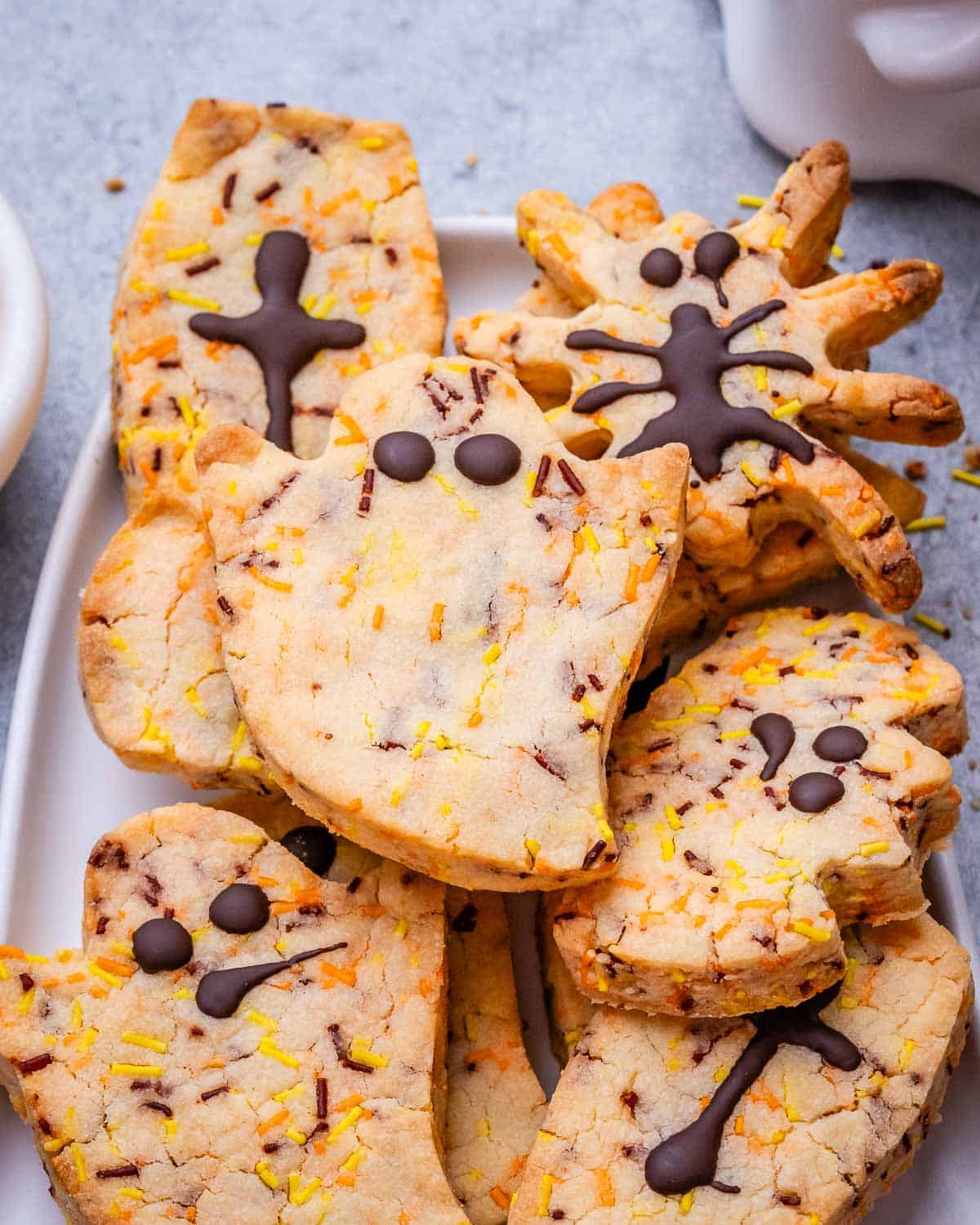 Halloween-shaped cookies on a plate. 