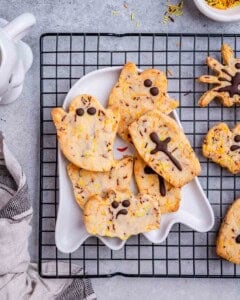 cookies on a plate over a cooling rack.