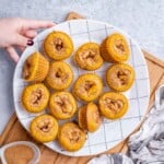 a plate with pumpkin muffins.