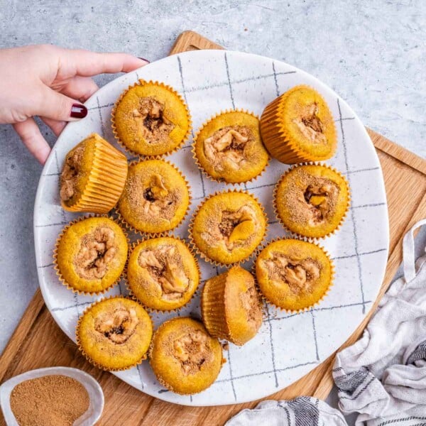 a plate with pumpkin muffins.