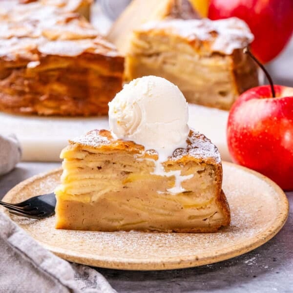 a slice of apple cake on a plate.