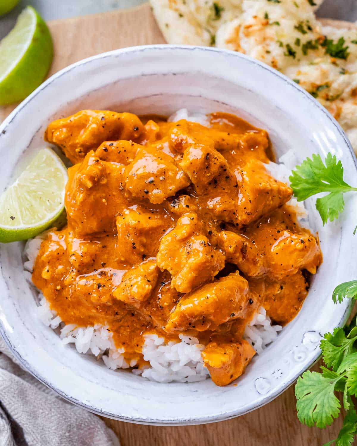 chicken curry over rice in a bowl.