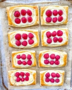 baked raspberry cheese danish from oven before glazing.