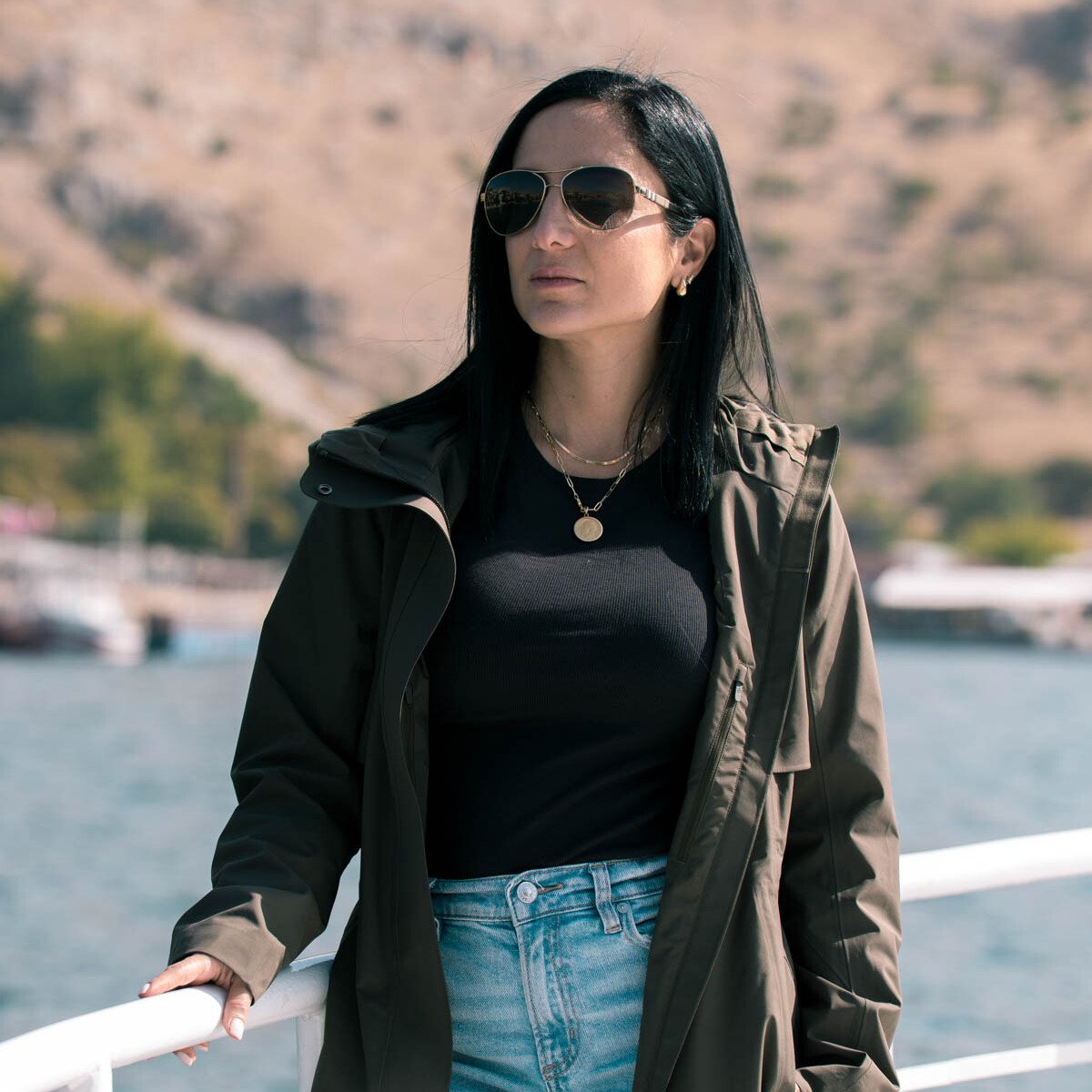 Rena is standing on a boat in Turkey.