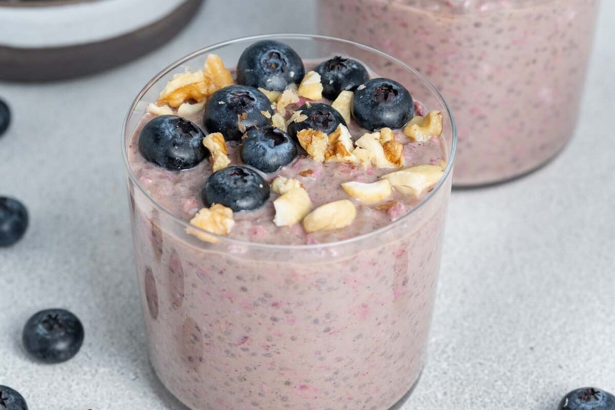 overnight oats with blueberries in a cup.
