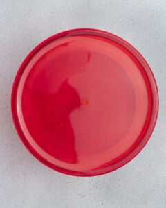 bowl with blueberry overnight oats covered to be stored.