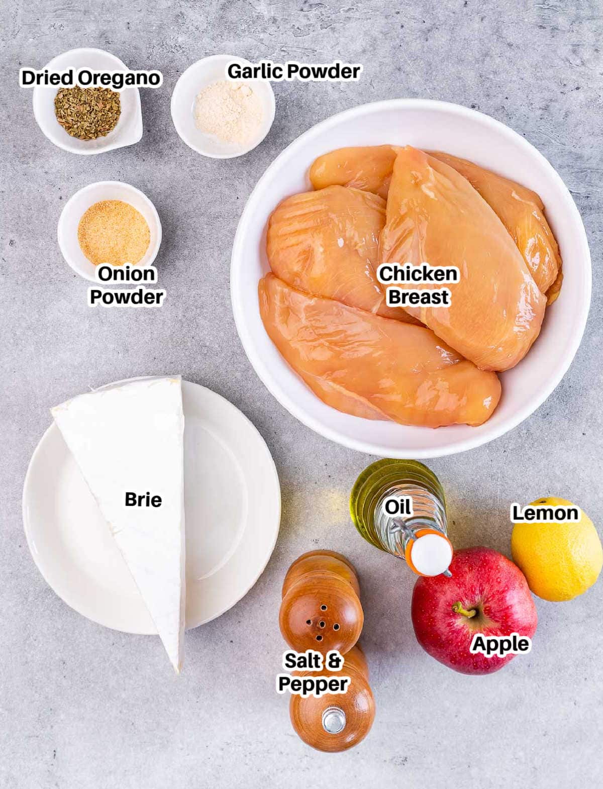 ingredients to make stuffed chicken breasts with brie and sliced apples. 