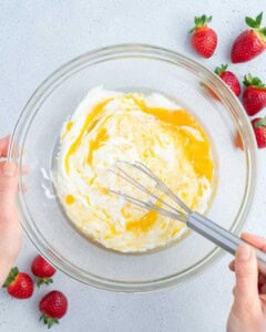 yogurt, eggs, oil, and sugar were added to a bowl and mixed.