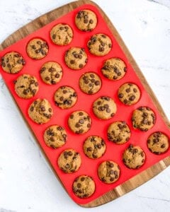 baked mini muffins in muffin mold.