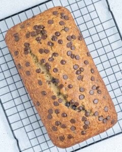 banana bread cooling on a wire rack.