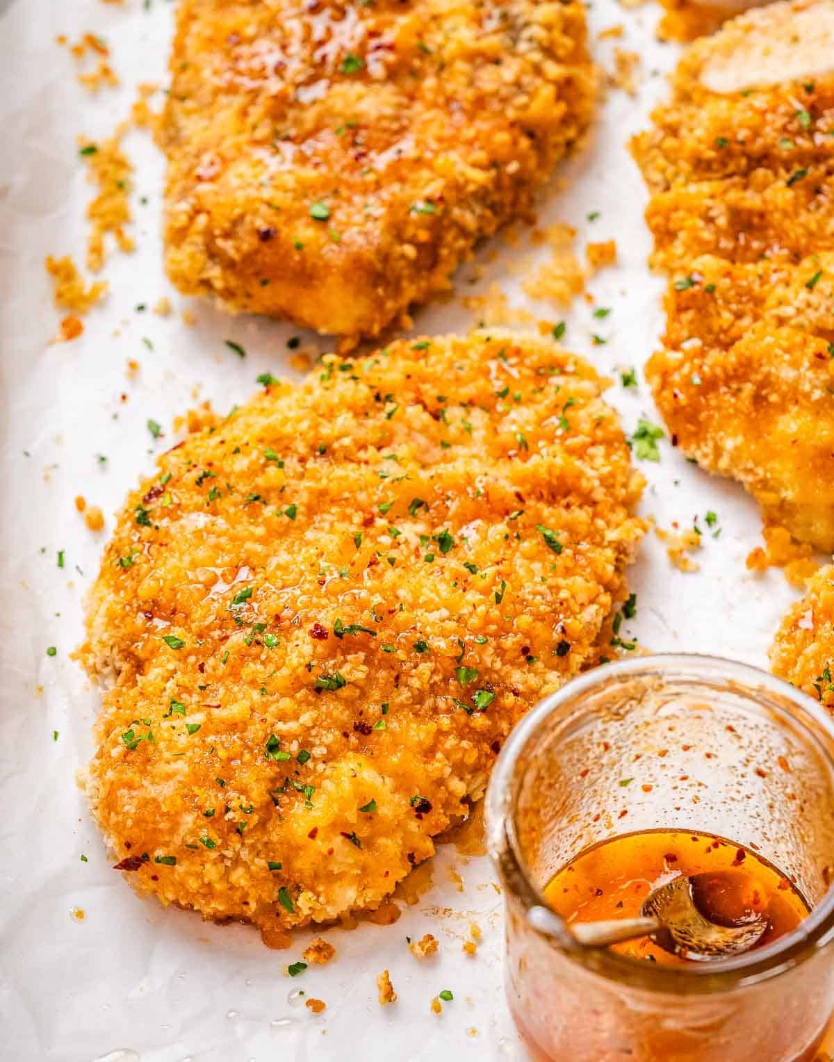 A tray with baked crispy honey chicken.