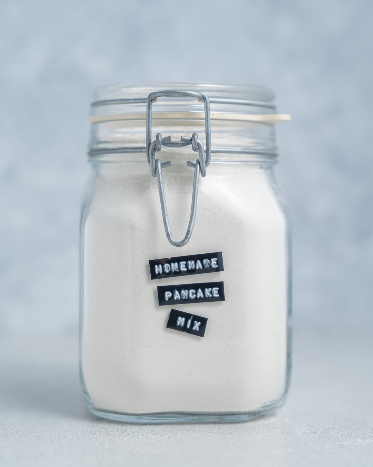 A clip-top jar of homemade pancake mix.