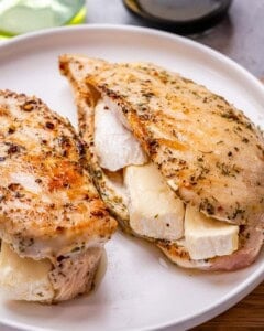 adding cheese slices inside the chicken breast.