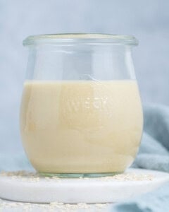 Tahini dressing placed in a jar.