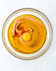 egg and oil added over the blended date and milk.