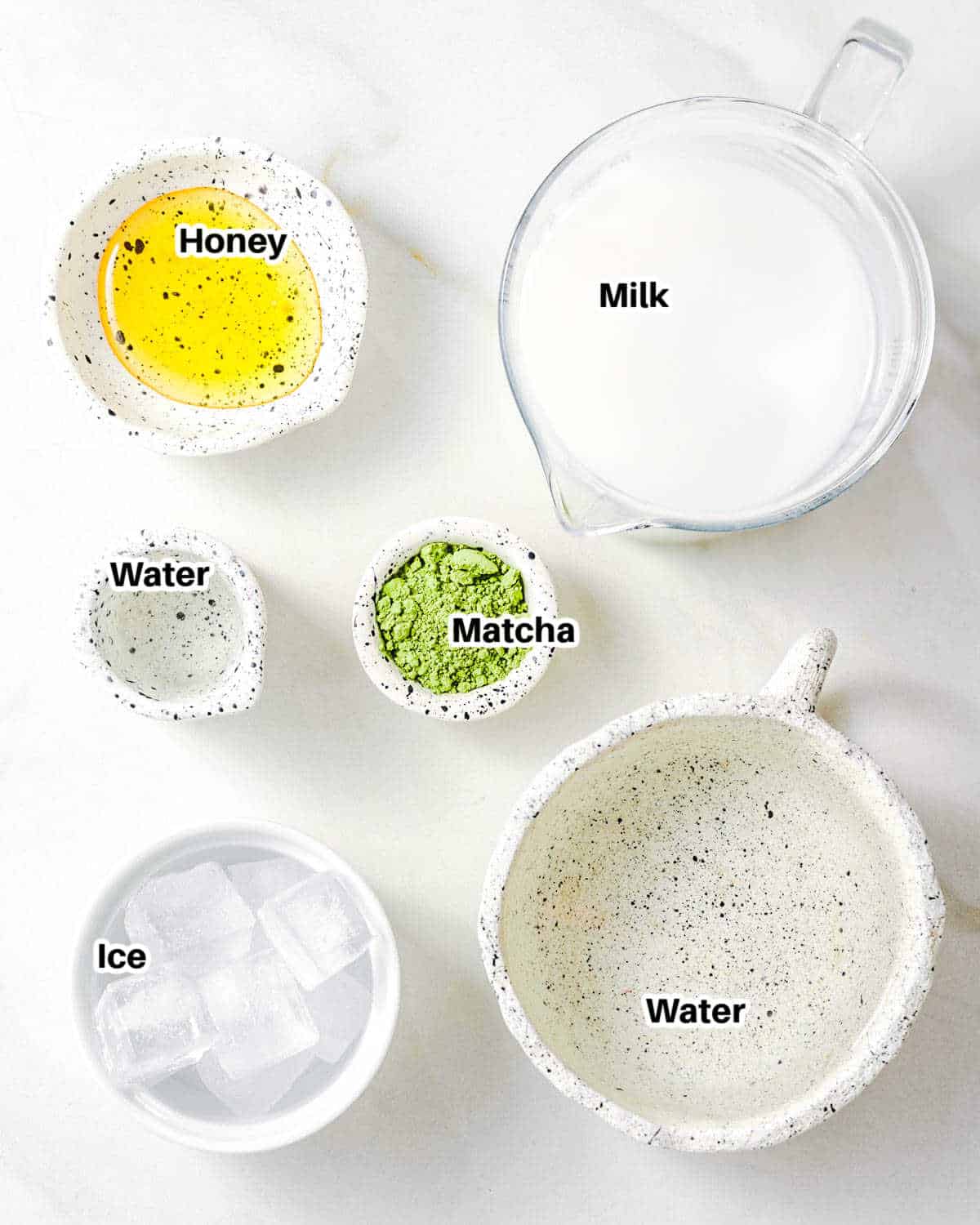 ingredients to make an iced matcha latte.