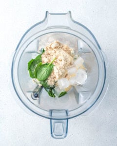 ingredients to make shamrock smoothie in a blender.