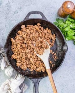 cooked ground beef in a pan.
