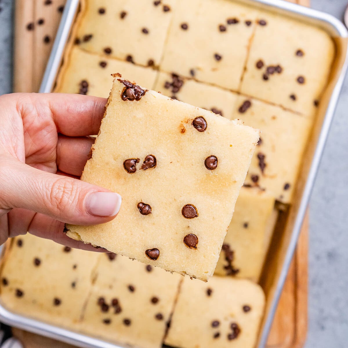 hand holding a pancake square.