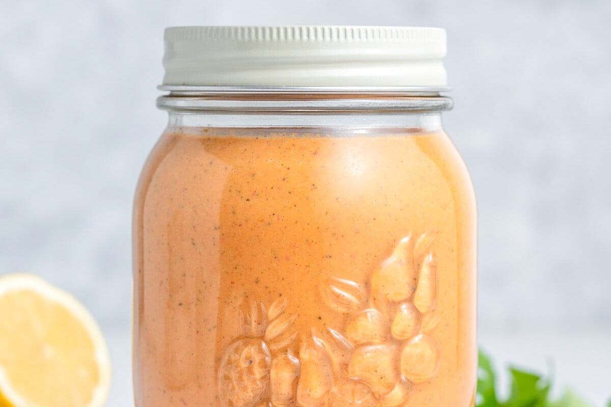 a jar with peri peri sauce.