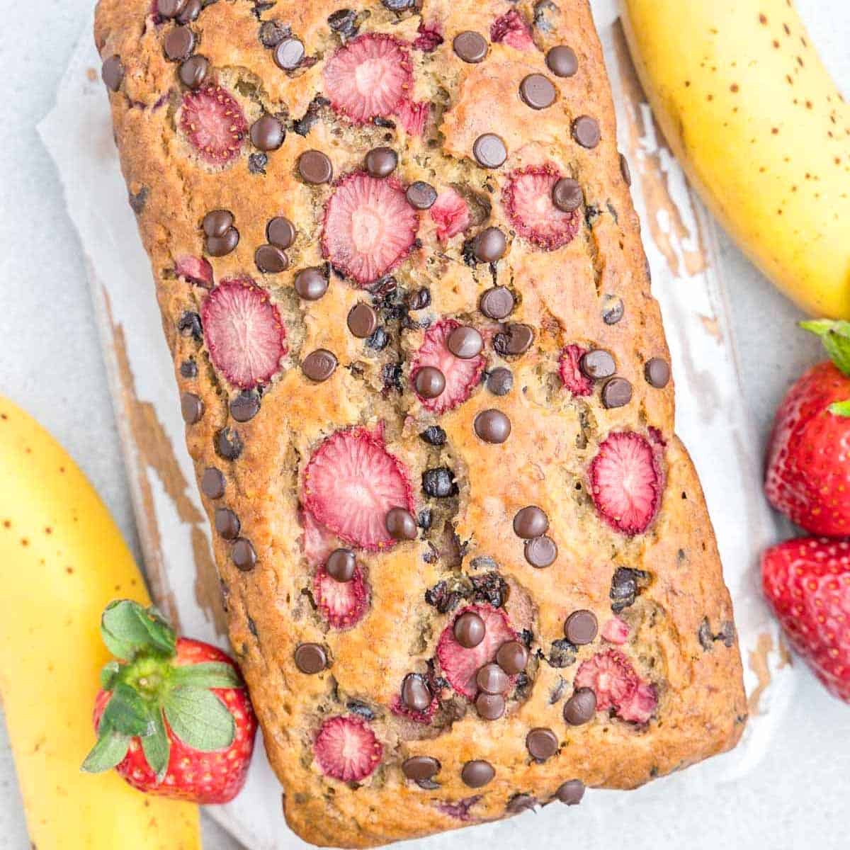 banana bread unsliced on a flat surface.