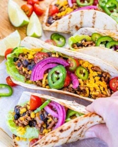 hand holding a beef taco.
