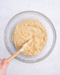mixed batter with a spatula in a bowl.