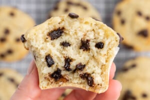 hand holding half a muffin.