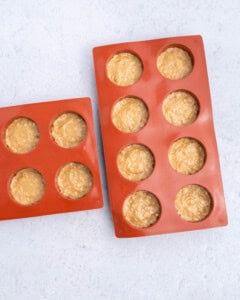 silicone molds placed in a red silicone mold.