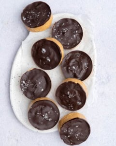 peanut butter protein oat cups placed on a plate to be stored.
