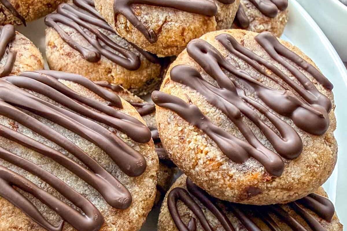 cookies drizzled with chocolate.