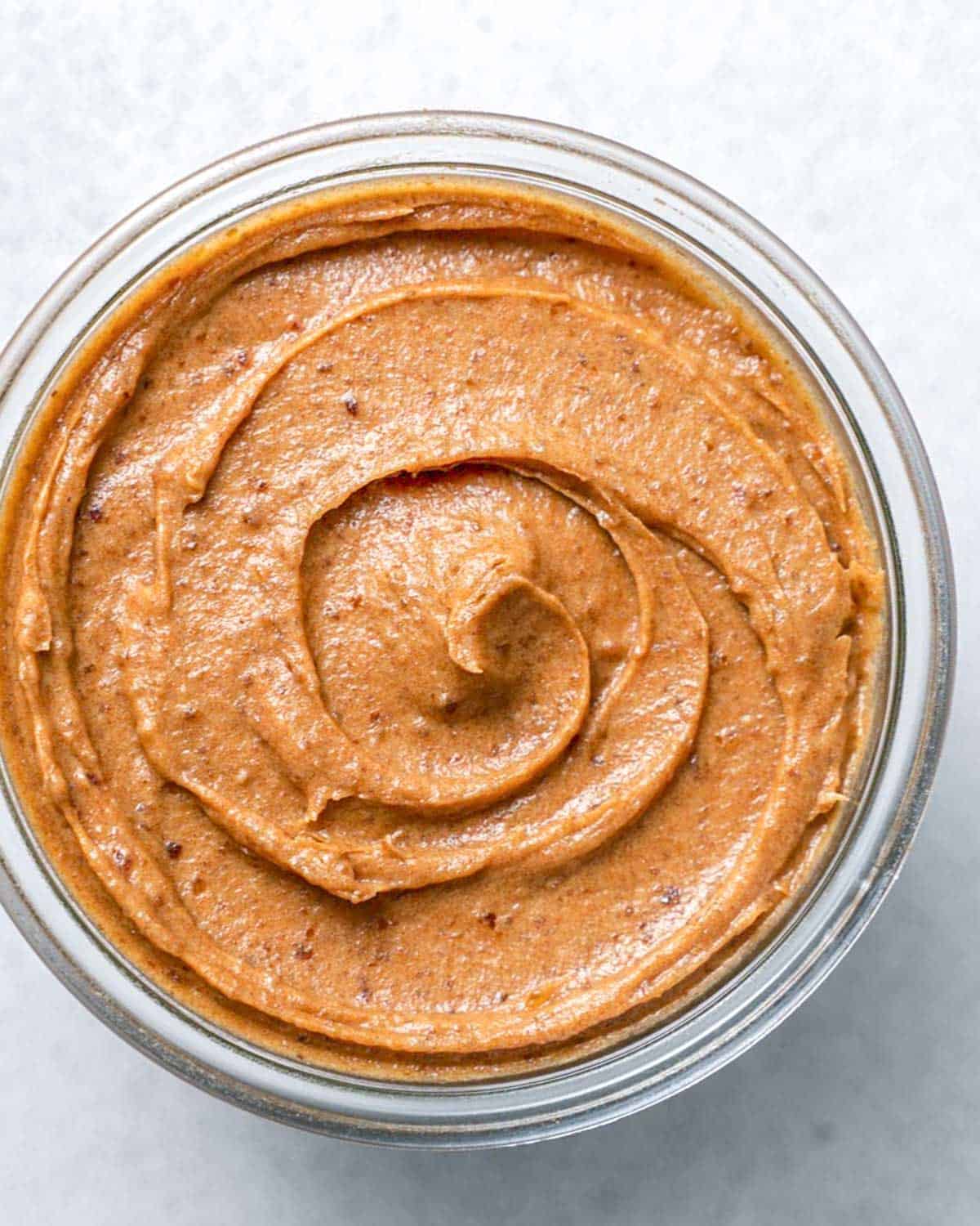 a jar filled with homemade date paste.