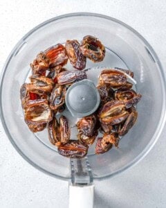 pitted dates added to food processor.