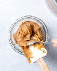 date paste being store in a jar.