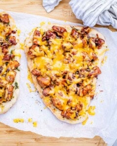melted cheese over the bbq chicken naan.