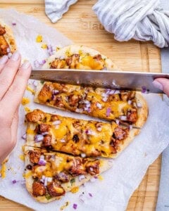 slicing the bbq chicken flatbread.