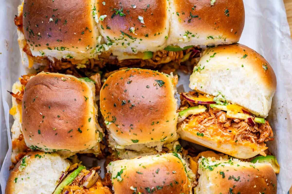 chicken sliders stacked next to each other.