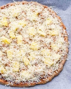 bbq pizza with all the toppings added before baking.