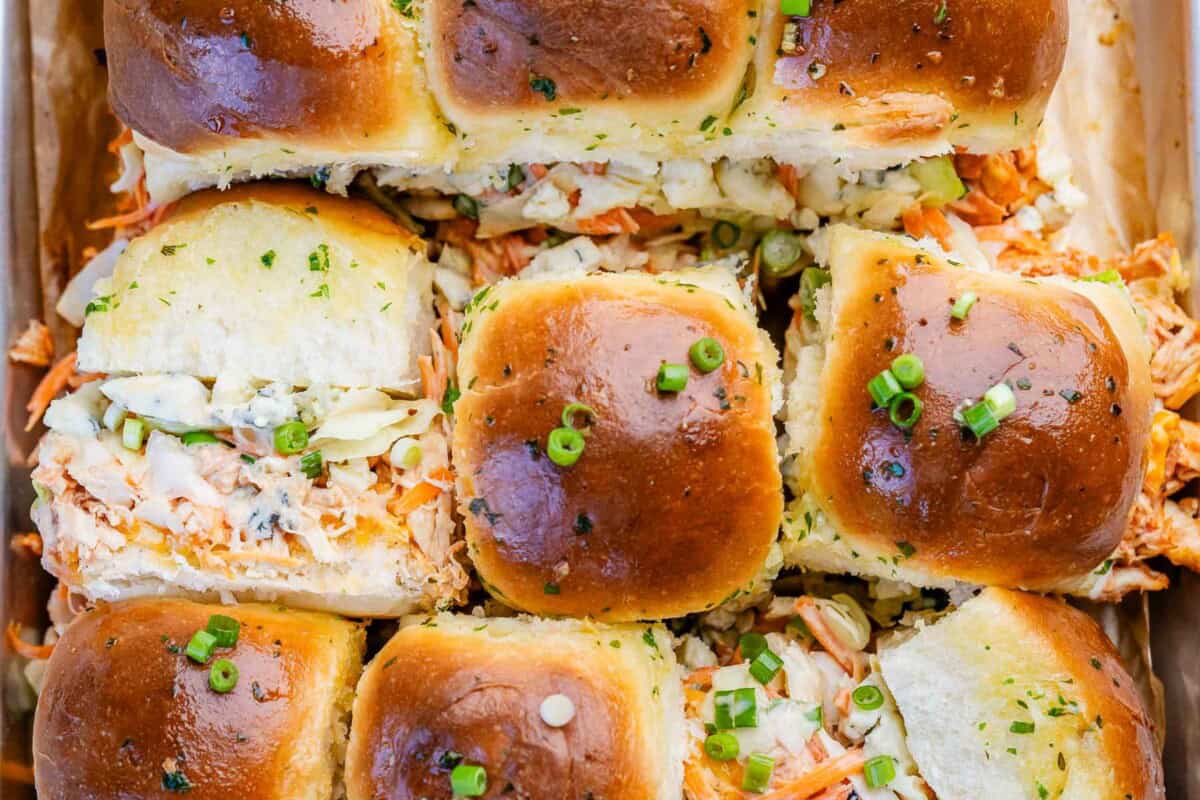 Buffalo chicken slider buns baked and laid out.