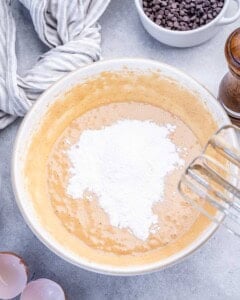 flour, baking soda, and baking powder, added to the egg batter.