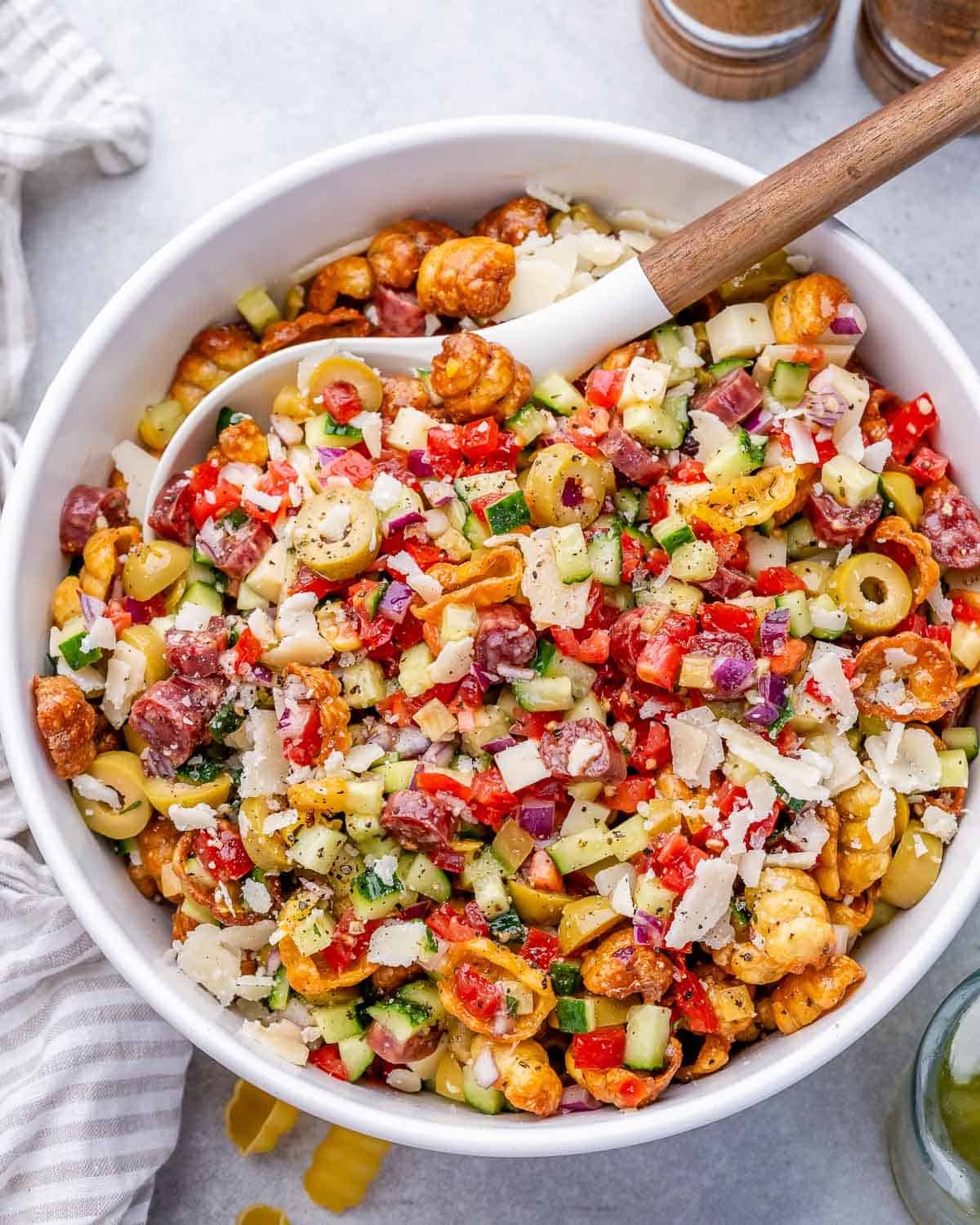 spoon a bowl with crispy pasta salad.