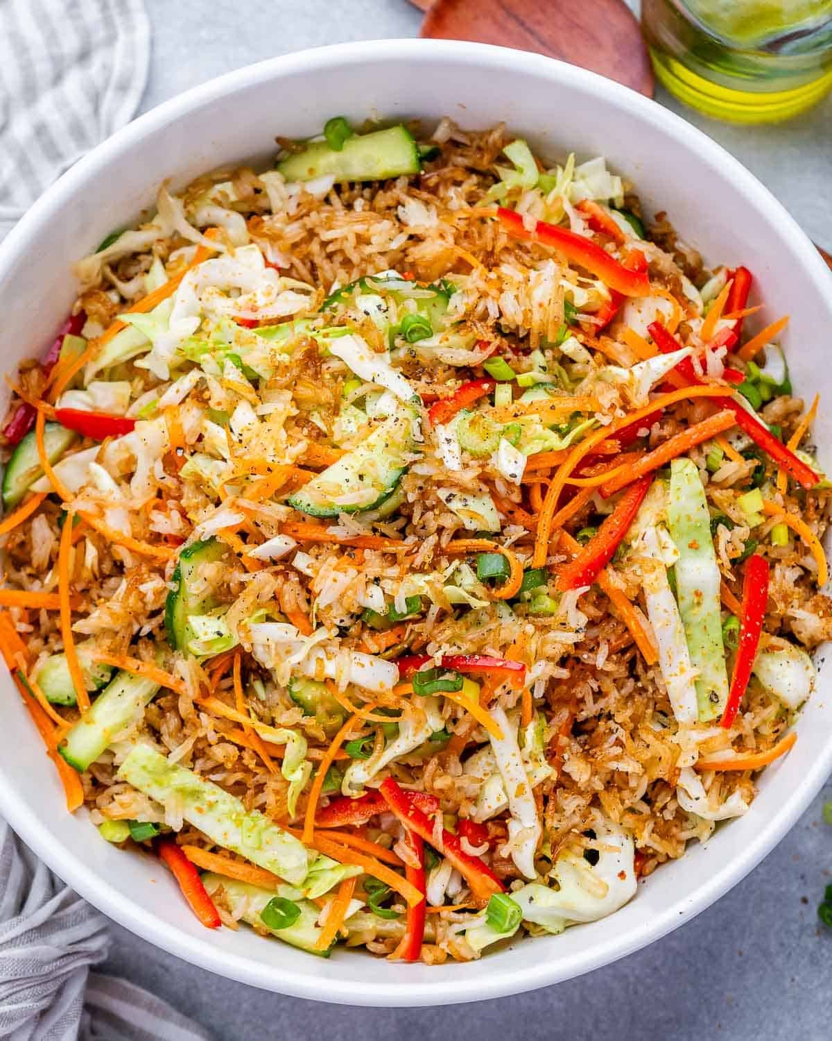 a large white bowl with crispy rice salad.