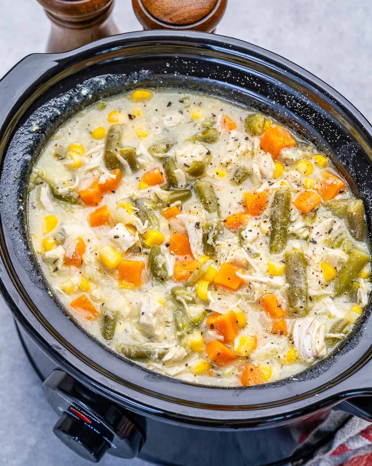 A crockpot filled with chicken pot pie filling.