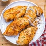 chicken breast cooked in an instant pot served on a plate.