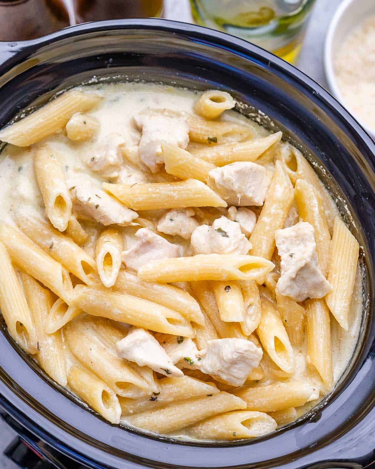 Chicken alfredo with penne pasta in a crock pot.