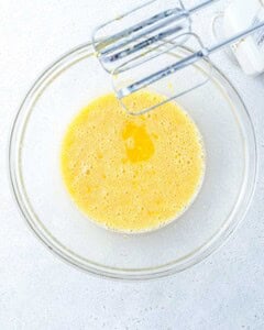mixing the olive oil, eggs, lemon juice, and vanilla in a bowl.