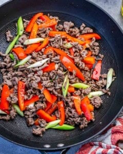 bell pepper and onions added with cooked ground beef.