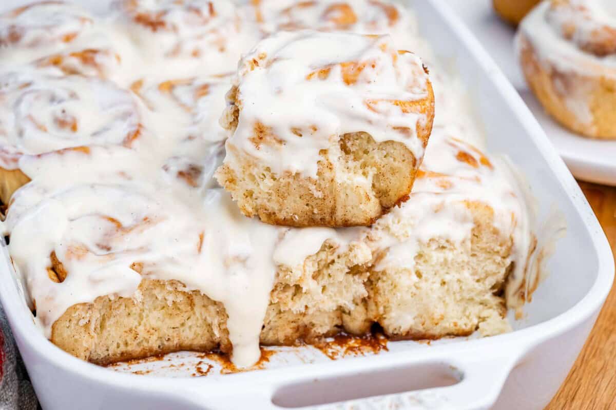 Cinnamon rolls in a baking dish.